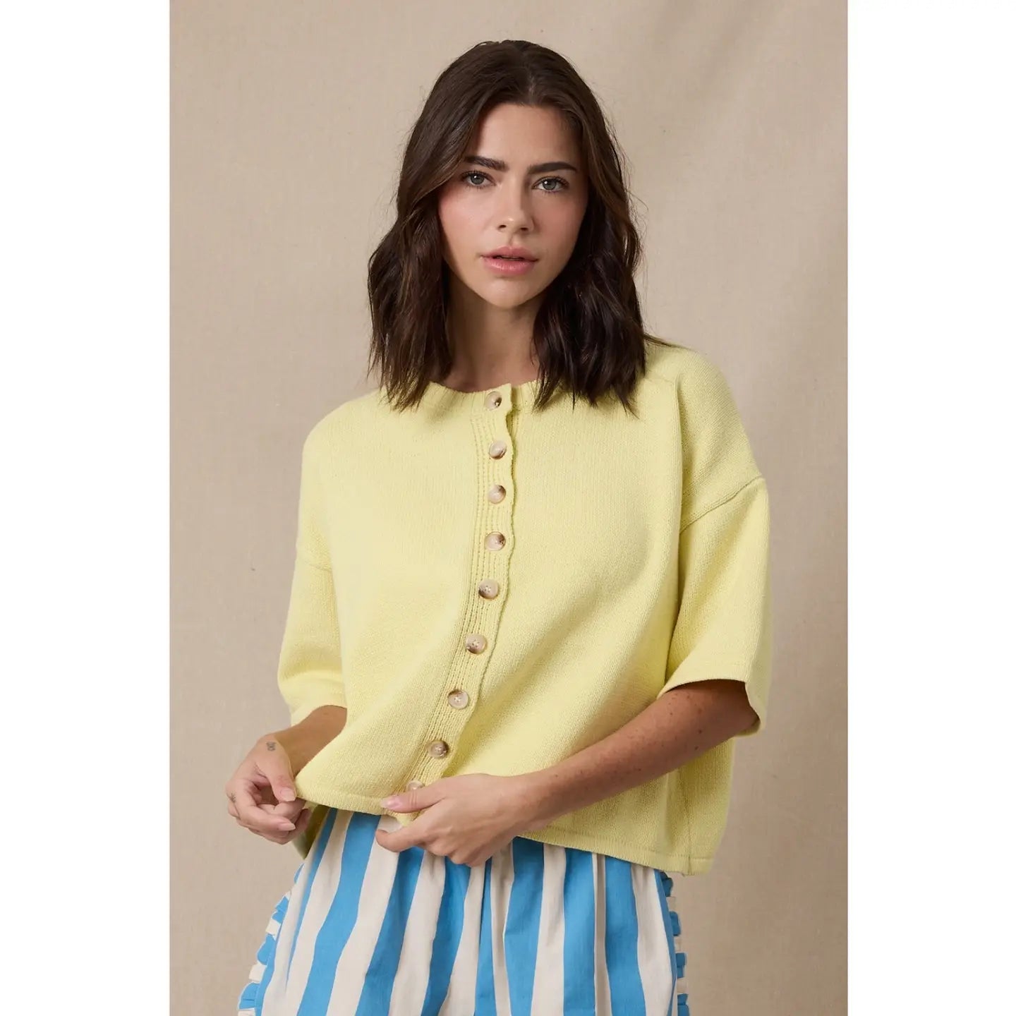 Spring button from sweater lemon