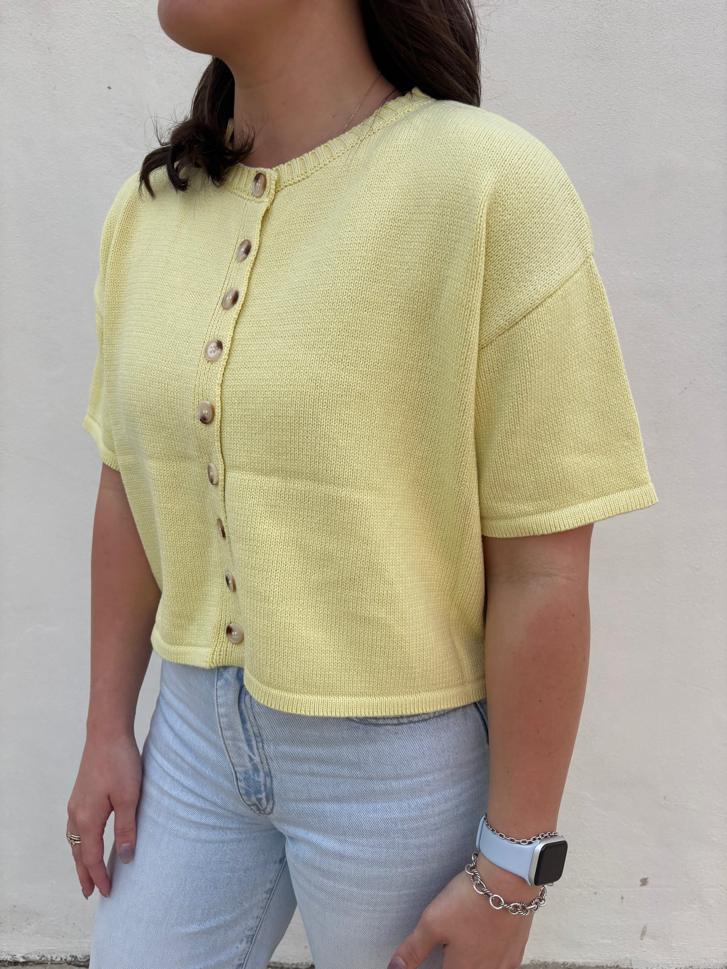 Spring button from sweater lemon