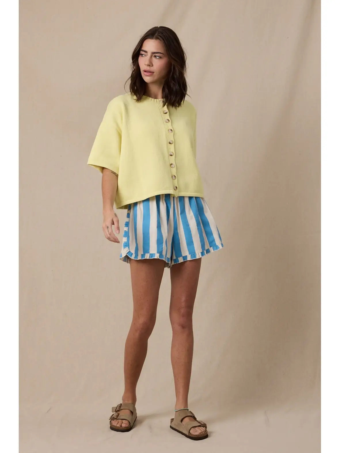 Spring button from sweater lemon